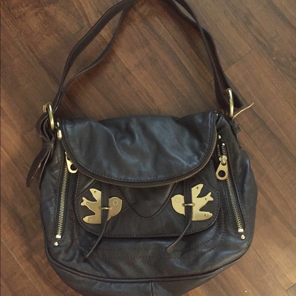 Marc Jacobs “petal to the metal” Natasha bag.